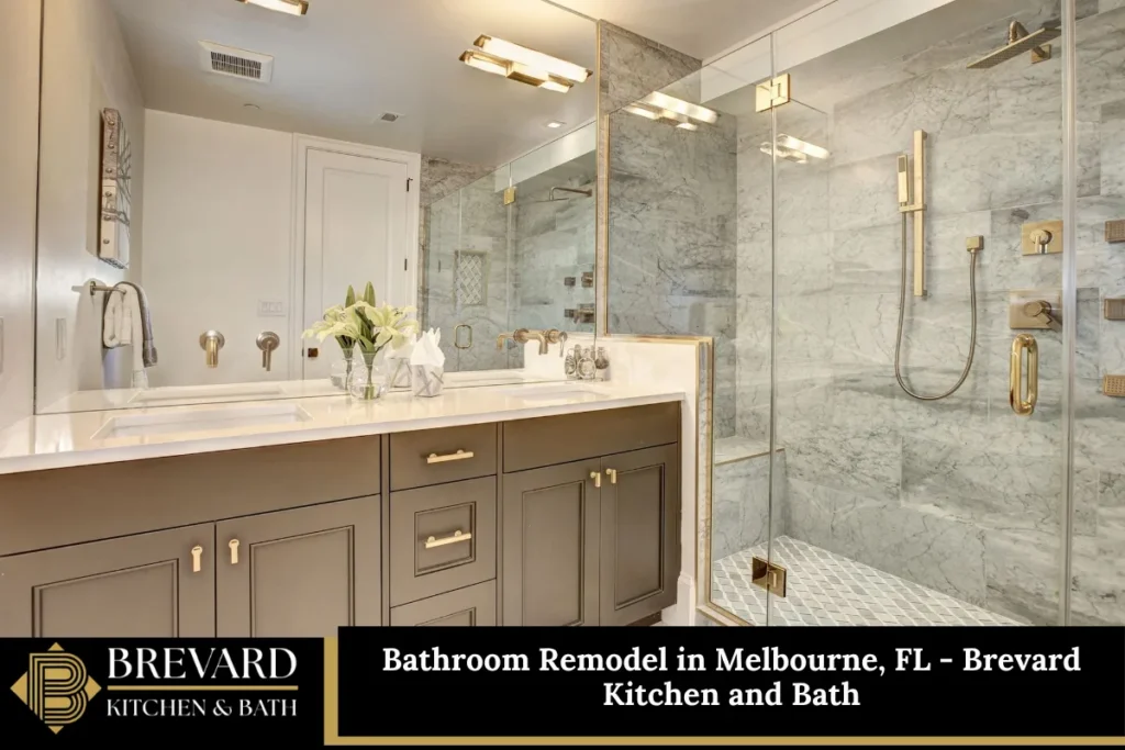 Remodeled bathroom with a gray double vanity and glass shower in Melbourne, FL