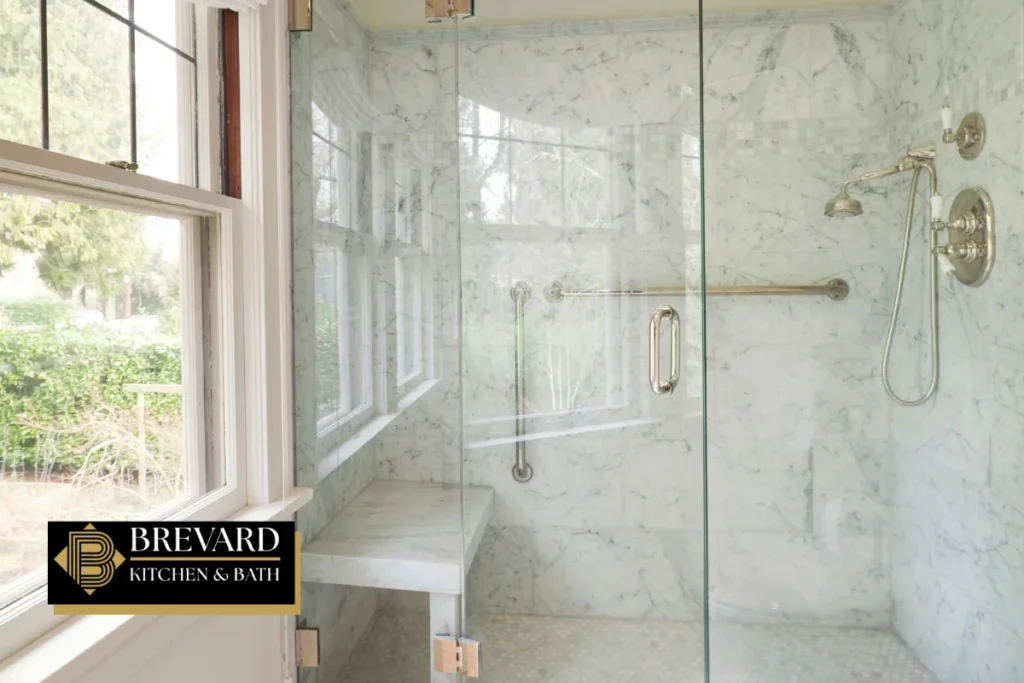 Glass walk-in shower with a window for natural ventilation